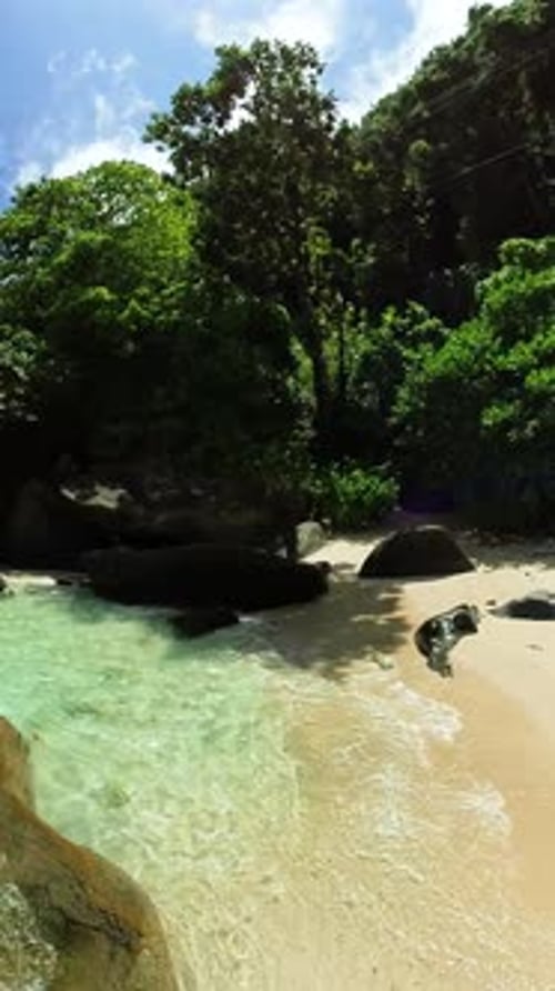 Tropical Beach with Turquoise Lagoon and Rocky Shoreline Seychelles Mahe