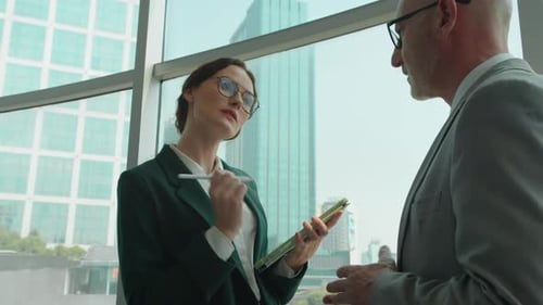 Entrepreneurs Discussing Business Plan in Office