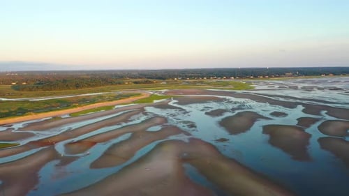Cape Cod Bay Aerial Drone Footage of Beach at Low Tide and Houses with People Walking, Sand Bars and