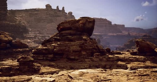 Vast Rocky Landscape with Towering Formations Under a Clear Blue Sky