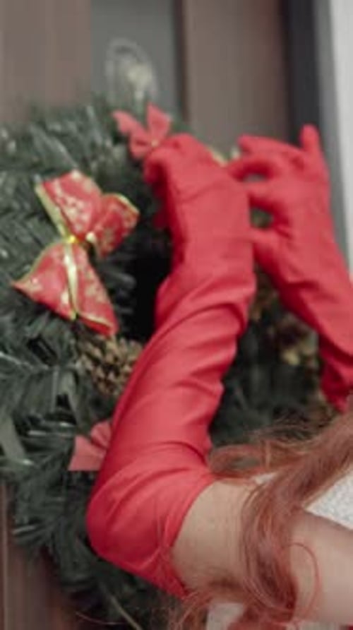 Holiday Wreath Hanging on Brown Door