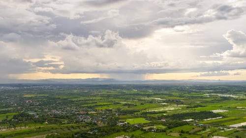 Hyperlapse 4K video of rainstorms and dark clouds moving over the central plains of Thailand.
