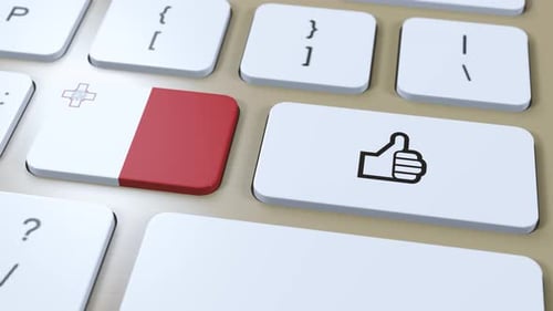 Maltese Flag and Like Button Pressed on a Computer Keyboard