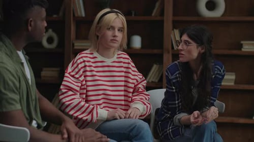 Diverse Group of Young Adults Talking Together