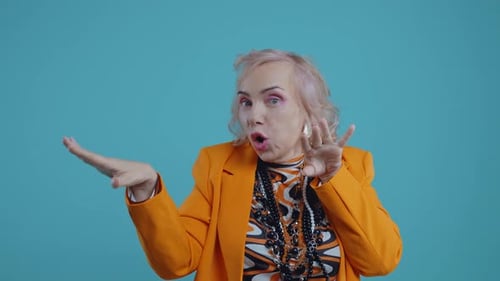 Senior Woman Dancing and Using Hand Gestures