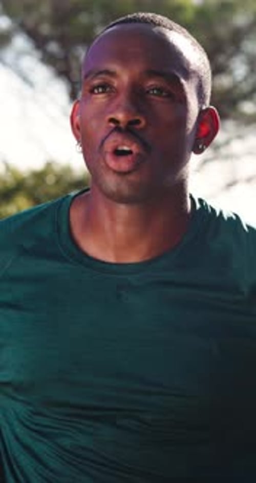 Runner, breathing and tired with black man in nature for resting stop, fitness and break