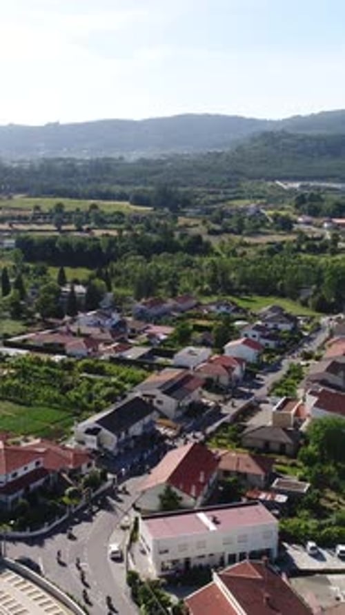 Aerial View of a Quaint Town in Hills