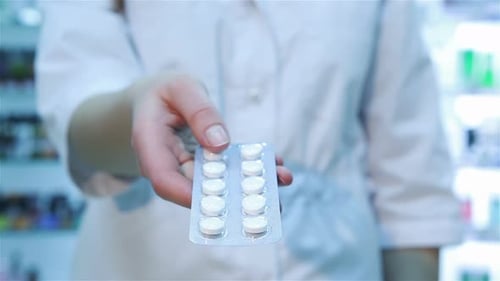Pills Blister Pack Presented by Medical Professional