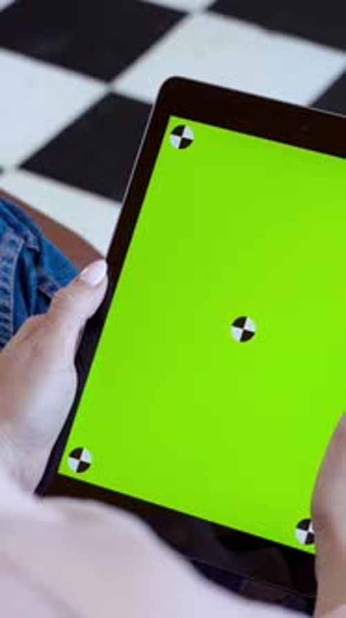 Closeup of Man Holding Tablet and Touching Green Screen Stock Fooatge Young Freelancer Uses Tablet