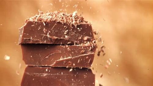 The Grated Chocolate Falls on the Chocolate Slices Filmed on a Highspeed Camera at 1000 Fps