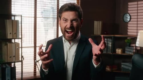 Angry Businessman Yelling in Office