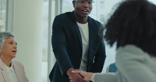 Business people, handshake and meeting in hiring, partnership or teamwork together at office