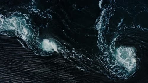 Waves of Water of the River and the Sea Meet Each Other During High Tide and Low Tide