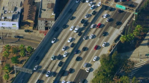 Aerial View Of Downtown La Traffic On The Freeway On A Sunny Day In Los Angeles, California. Shot...
