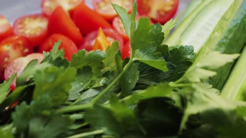 Fresh Tomatoes, Cucumbers, and Parsley Close-Up