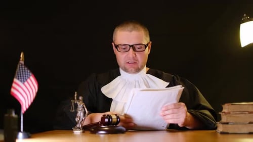 American Judge Reading a Court Verdict in a Trial