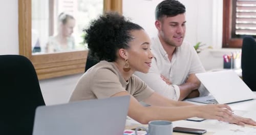 4k video footage of a group of young businesspeople having a meeting in a modern office