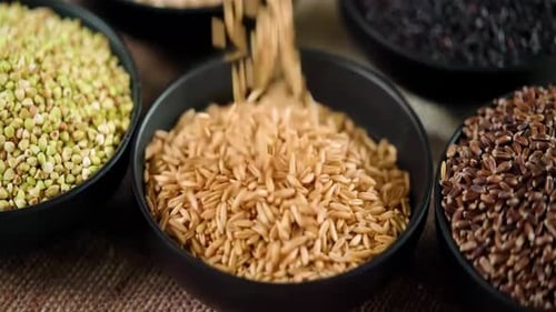 Pouring Grains Into Bowl Close Up Food