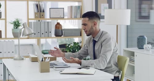 4k video footage of a businessman sweeping everything off his office desk in anger