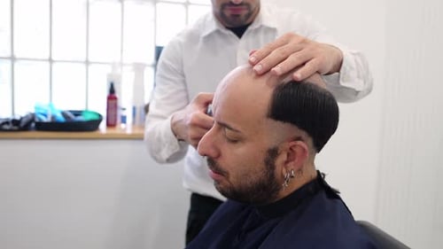 Hair Clinic Technician Performing a Hair Implant Procedure in Slow Motion