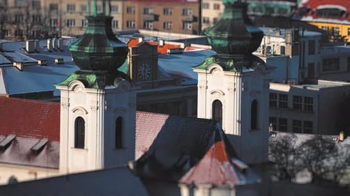 Aerial view of Prague downtown. Fresh snow on the roofs and the streets. Tilt-shift video.