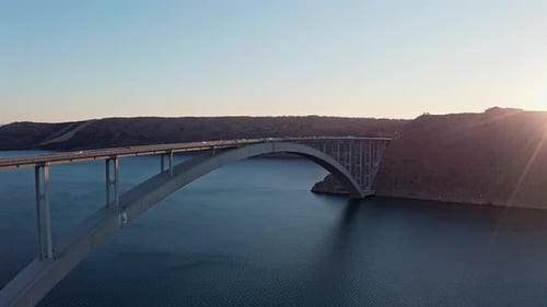 Drone shot of the bridge and ocean in the sunset 5