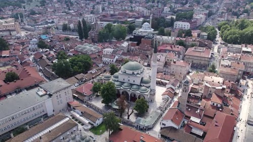 Aerial: Gazi Husrev-beg Mosque amidst Sarajevo's urban landscape. Bosnia