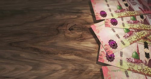 Saudi Arabia Rial 100 SAR money banknotes background loop