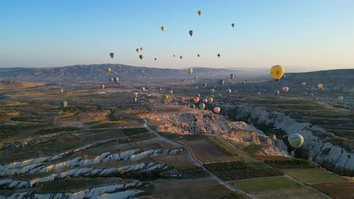 Hot Air Balloons Soar Over Cappadocia Valleys
