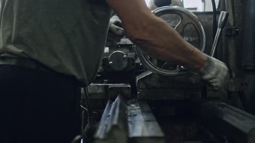 Precision metal lathe operation by skilled machinist