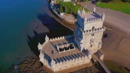 Drone Stay and Rotate Above Belem Tower Lisbon Portugal on Sunny Day