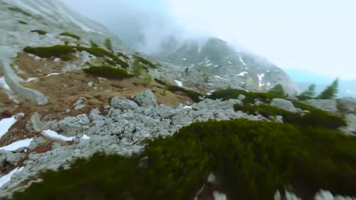 A Winter Wonderland from Above: Flying Over the Snow-Capped Mountains 4K