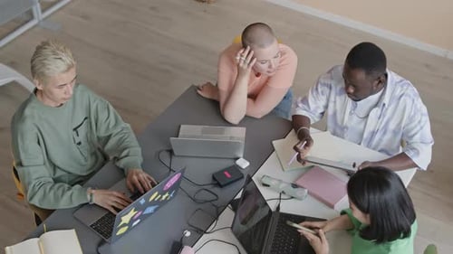 Group of Diverse Students Coding on Programming Class