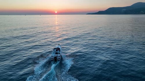 Sports Boat Sails and Makes Beautiful Turns Aerial View 4 K