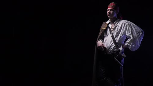 Man Dressed as a Pirate Posing in Studio