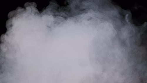 Rising Grey and White Vaporous Smoke on Black