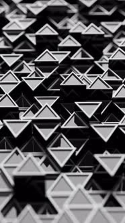 Animación en bucle de patrones triangulares 3D con desenfoque de profundidad de campo.