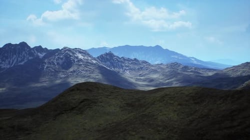 Majestic Mountain Landscape Under a Clear Blue Sky in the Afternoon Light