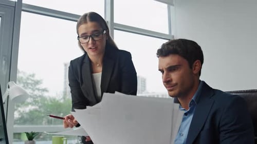 Nervous worker reporting boss in office while angry executive shouting about marketing results