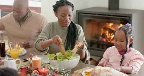 Warm Family Meal Around the Fireplace