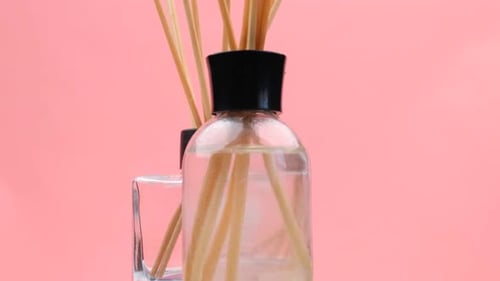 Aromatherapy Diffuser Bottles on Pink Background