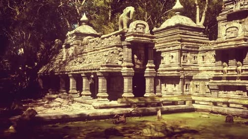 Ancient Temple Ruins Surrounded By Lush Greenery in Cambodias Serene Landscape