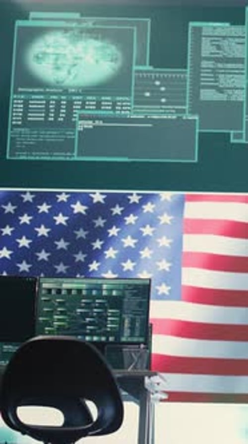 Computer Monitors with Flag in Empty Cyber Security Office