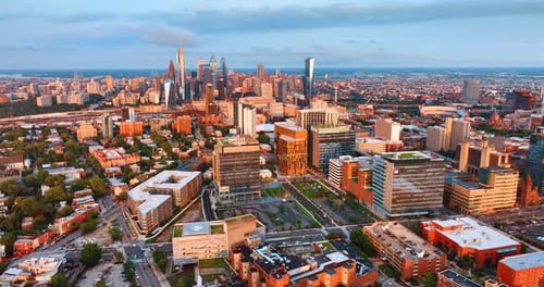 Sunlit scenery of Philadelphia downtown at sunset. Skyscrapers complex in the centre of the footage