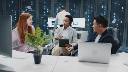 Close Up Meeting in Data Center Multiethnic Experienced Staff of IT Workers Communicating About