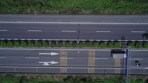 Freeway, highway or motorway with traffic on sunny clear day with all types of motor vehicles. Top d