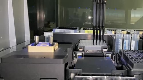 Automatic pipetting robot analyze DNA. Molecular Biology Laboratory Research