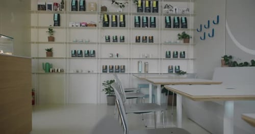 Cozy Cafe with Modern Interior Wooden Tables and Comfort Chairs