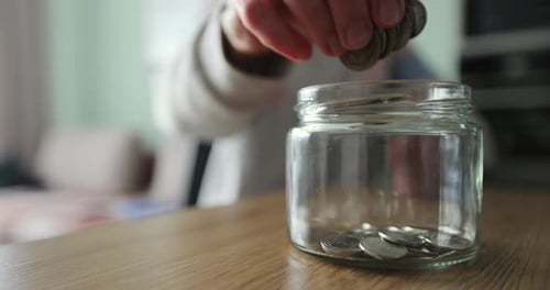 Saving Coins in a Glass Jar
