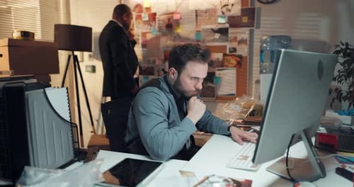 Computer, thinking and detective in office with typing for research on case with problem solving